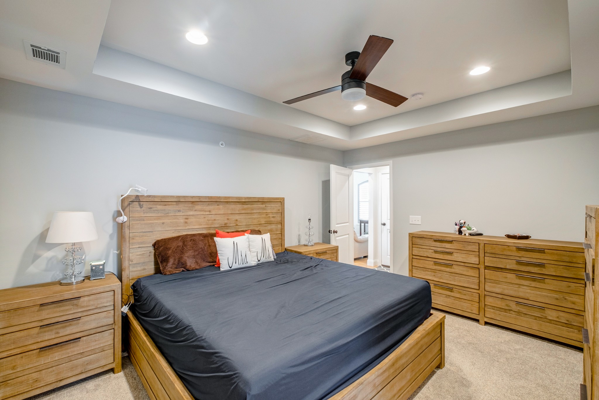 347 Preakness Circle Pleasant View, TN 37146 - Photo 11 of 29 a bedroom with a bed and wooden floor