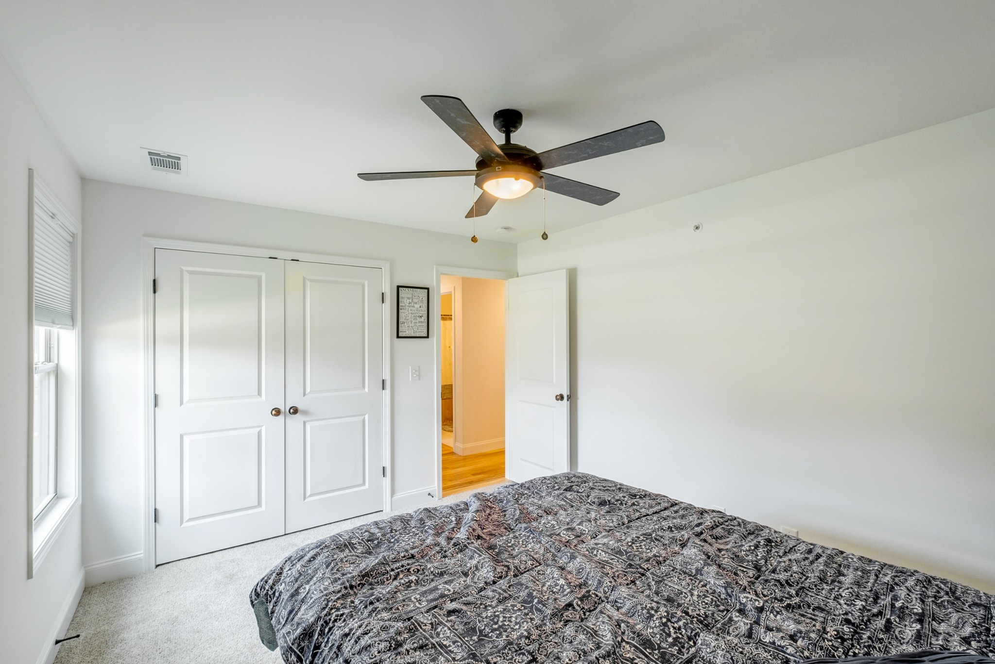 347 Preakness Circle Pleasant View, TN 37146 - Photo 18 of 29 a bedroom with a bed and a ceiling fan