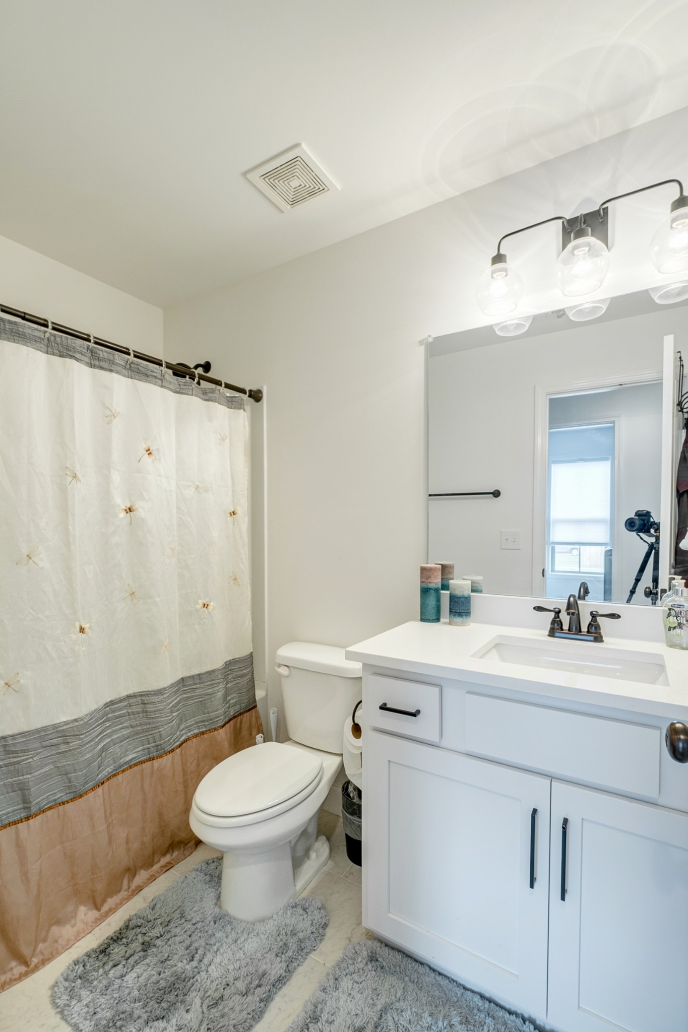 347 Preakness Circle Pleasant View, TN 37146 - Photo 19 of 29 a bathroom with a toilet a sink and a mirror