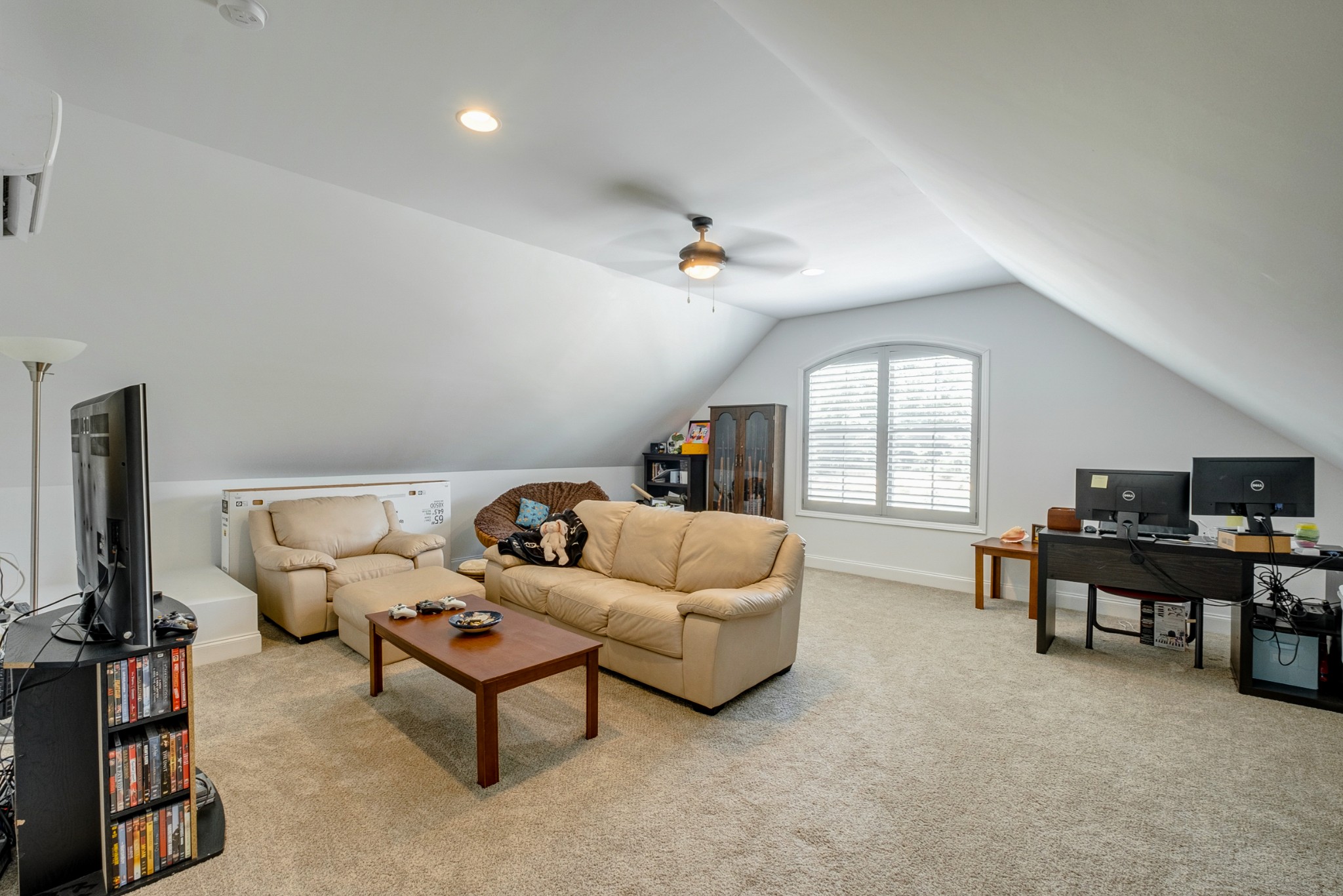 347 Preakness Circle Pleasant View, TN 37146 - Photo 24 of 29 a living room with furniture and a flat screen tv