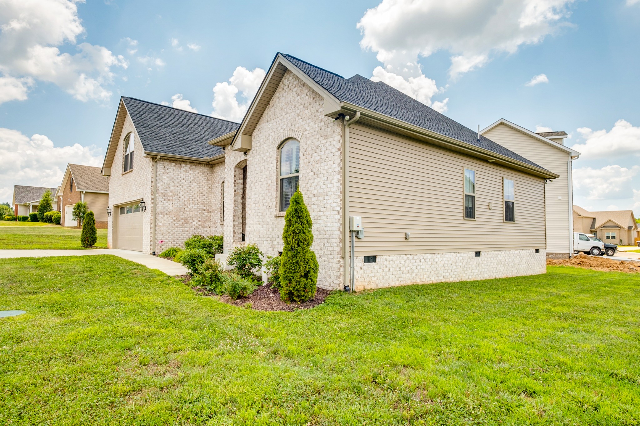 347 Preakness Circle Pleasant View, TN 37146 - Photo 27 of 29 a front view of a house with garden