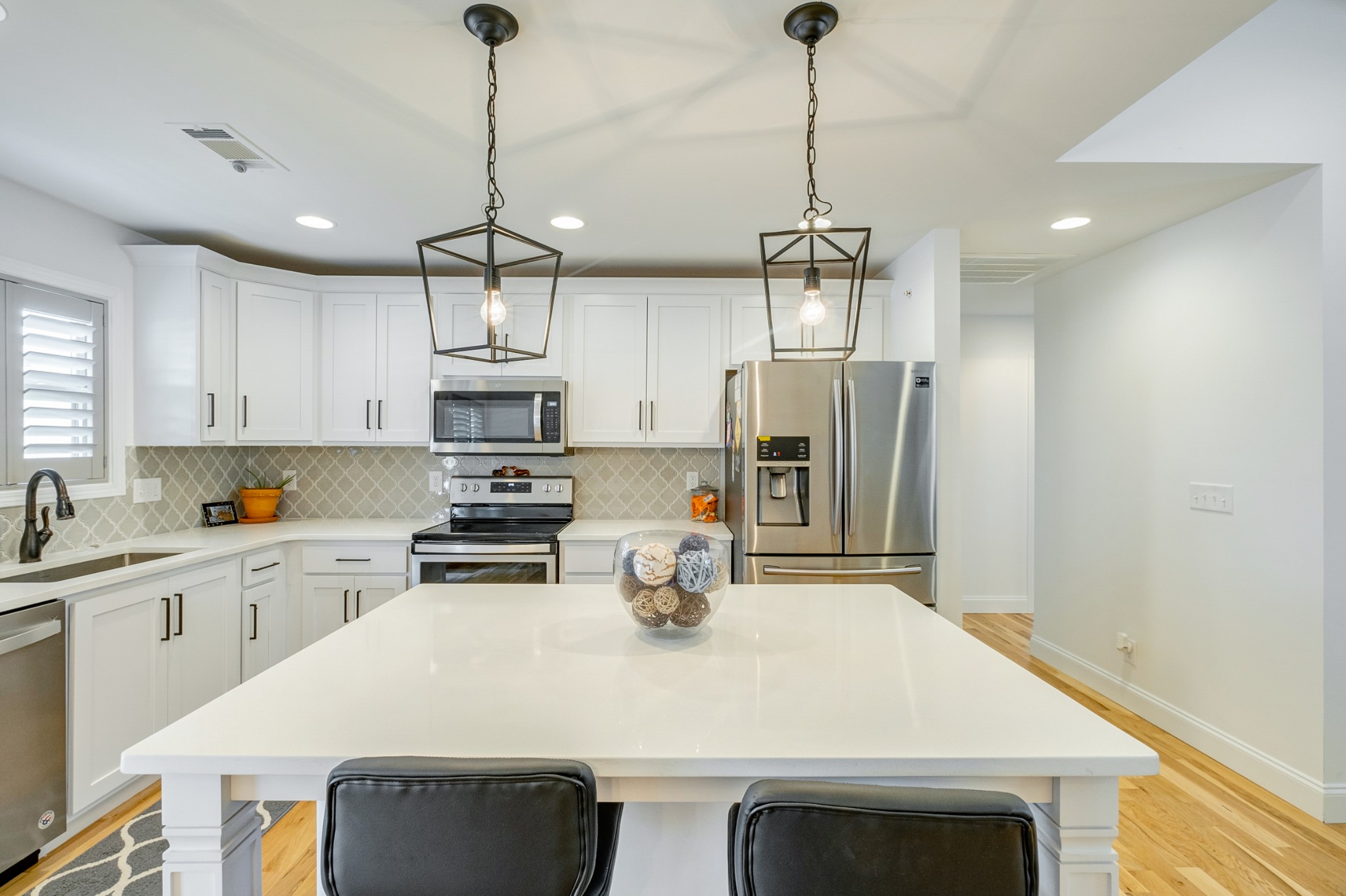 347 Preakness Circle Pleasant View, TN 37146 - Photo 7 of 29 a kitchen with stainless steel appliances a stove sink and refrigerator