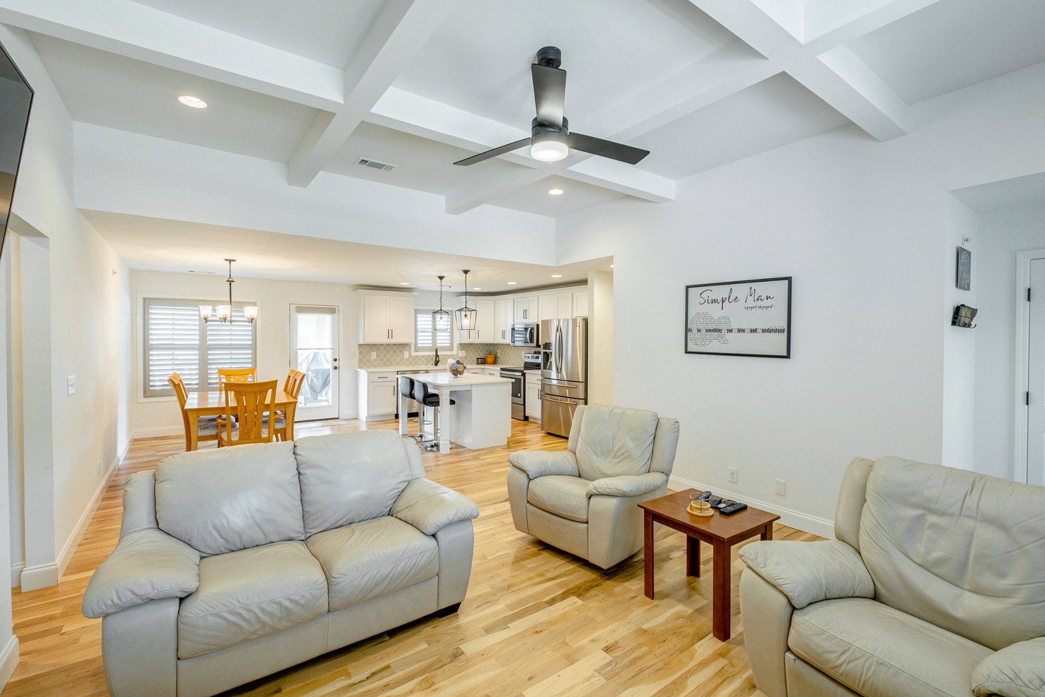 347 Preakness Circle Pleasant View, TN 37146 - Photo 9 of 29 a living room with furniture kitchen view and a chandelier