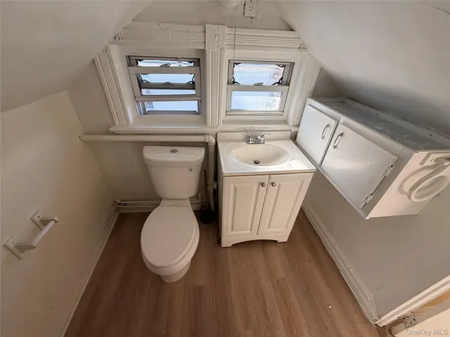 a bathroom with a toilet and a sink