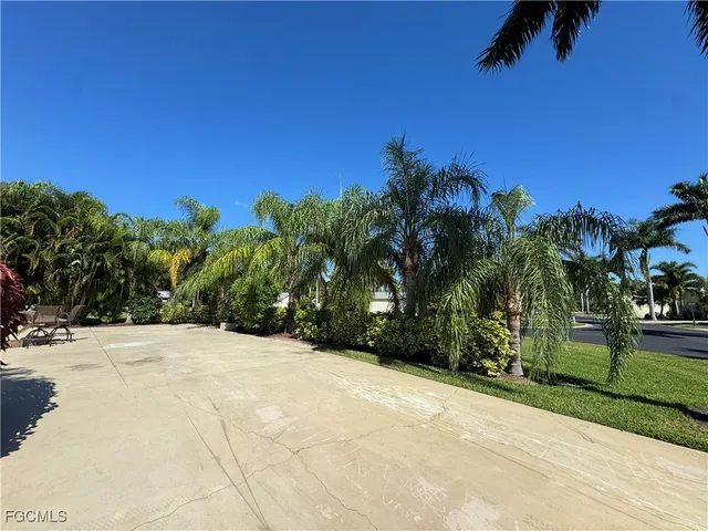 a view of a backyard of a house