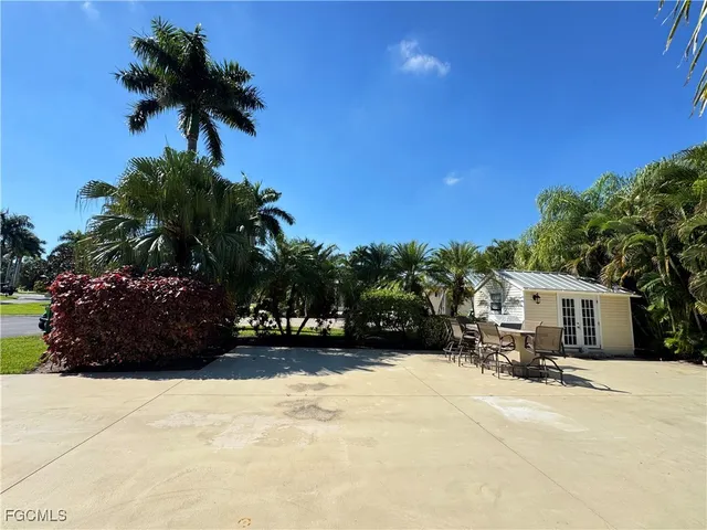 a view of house with outdoor space and street view