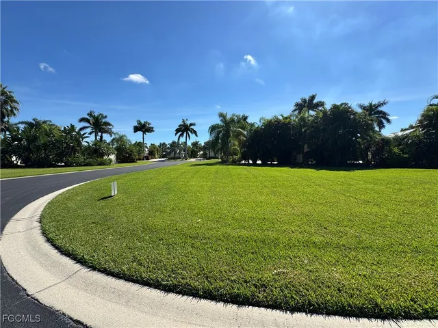 a view of a golf course with a garden