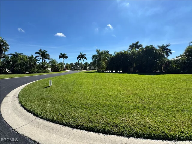 a view of a golf course with a garden
