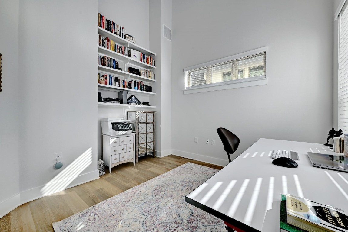 8509 Silverthorne Street Austin, TX 78744 - Photo 19 of 39 a view of a bedroom with furniture and closet