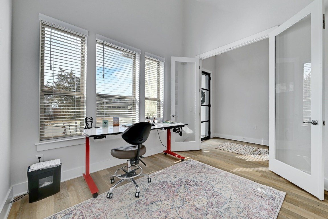 8509 Silverthorne Street Austin, TX 78744 - Photo 20 of 39 a view of a livingroom with workspace and a window