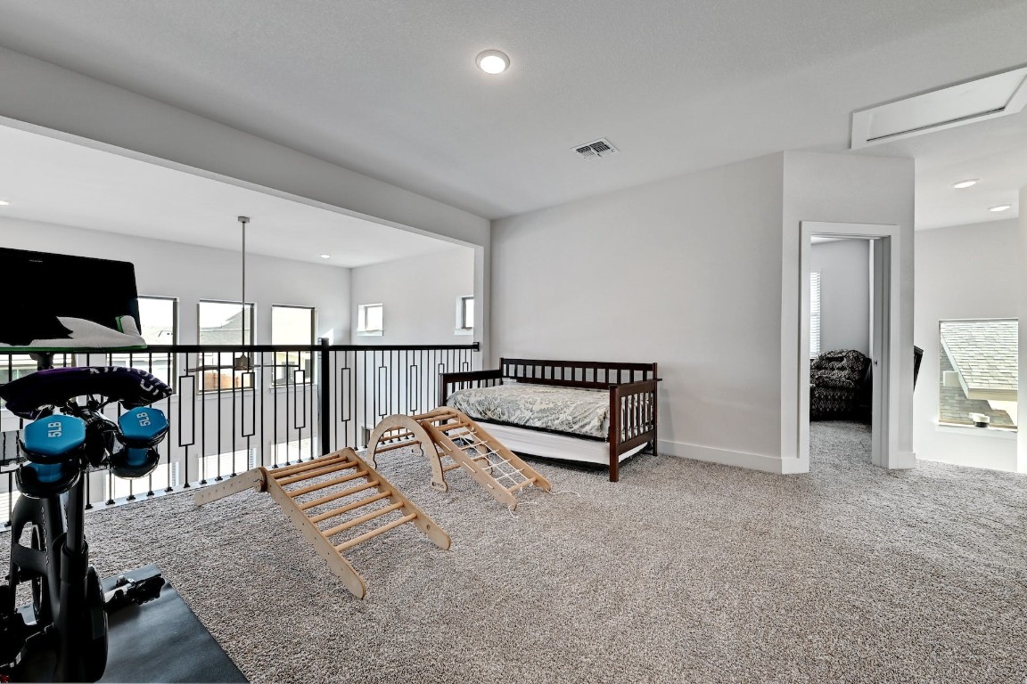 8509 Silverthorne Street Austin, TX 78744 - Photo 22 of 39 a view of a hallway with seating area
