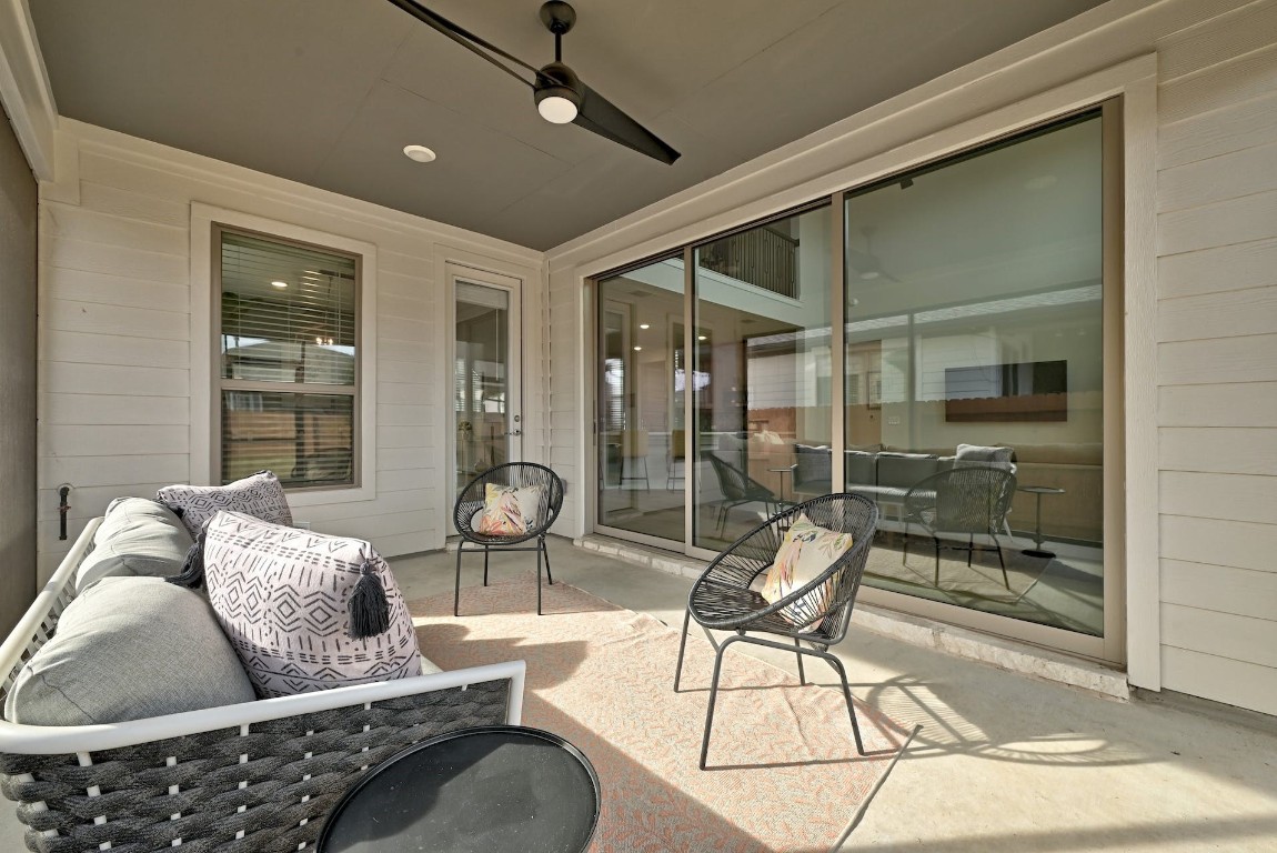 8509 Silverthorne Street Austin, TX 78744 - Photo 29 of 39 a living room with furniture and a glass door