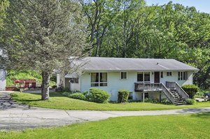 2204 Cary Road Algonquin, IL 60102 - Photo 1 of 9 a front view of a house with a garden