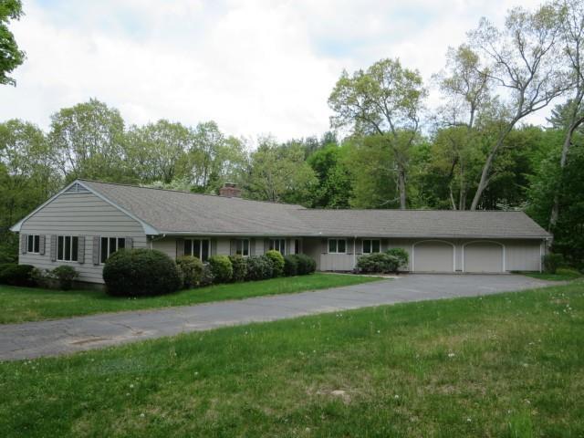 7 Edgewood Road Oxford, CT 06478 - Photo 1 of 1 a view of house with a big yard and large trees