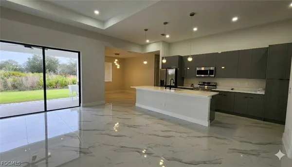a large bathroom with a large tub and shower