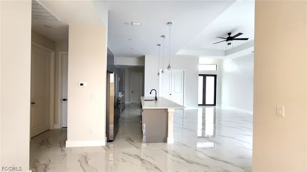 a view of a living room with a bathroom