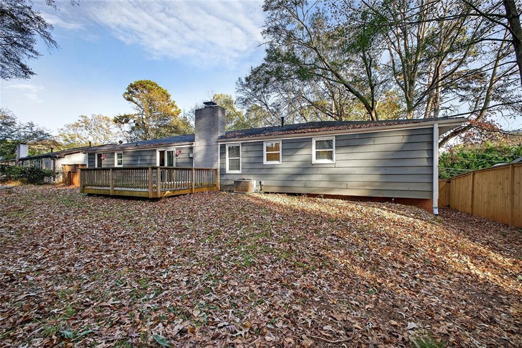 1200 Silver Hill Road Stone Mountain, GA 30087 - Photo 19 of 26 a front view of a house with garden