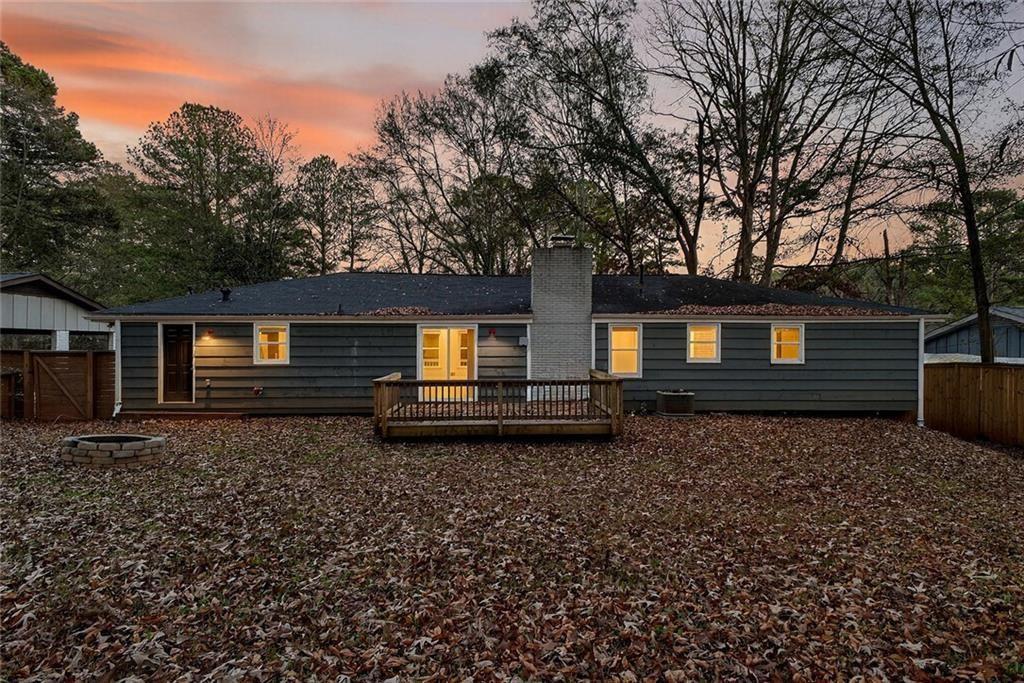 1200 Silver Hill Road Stone Mountain, GA 30087 - Photo 21 of 26 a view of a house with a yard