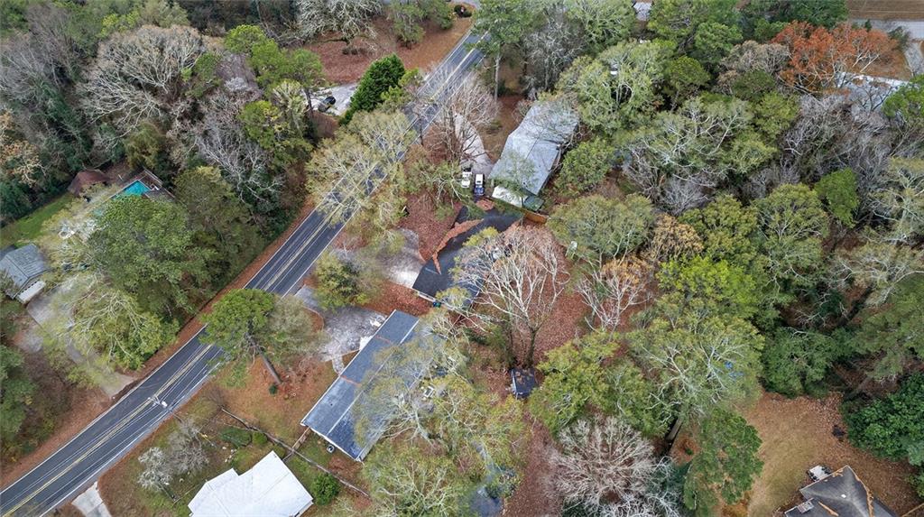 1200 Silver Hill Road Stone Mountain, GA 30087 - Photo 24 of 26 a backyard of a house with a yard and outdoor seating