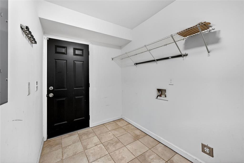 1200 Silver Hill Road Stone Mountain, GA 30087 - Photo 9 of 26 a view of a utility room with closet