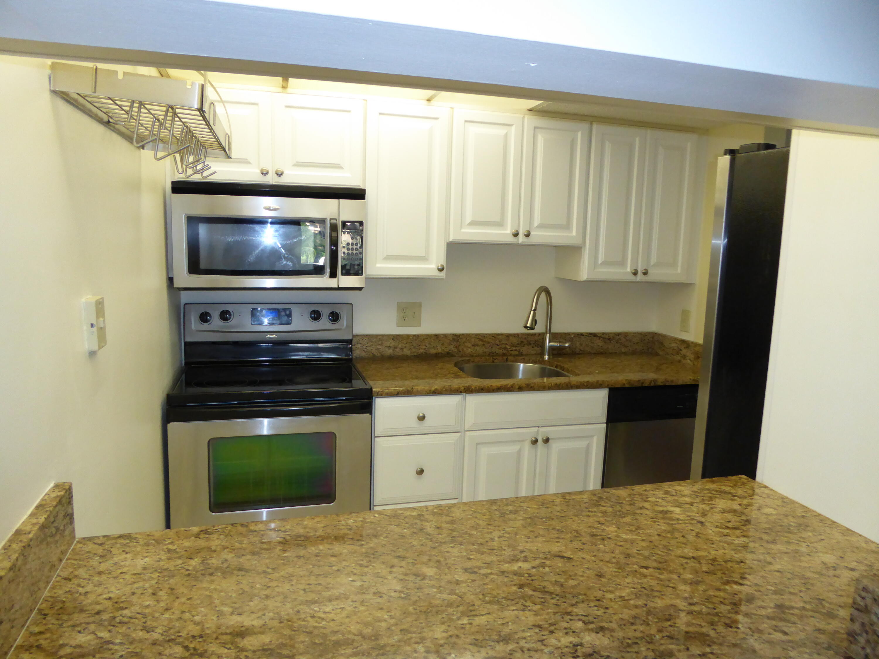 755 Dotterel Road, Unit 1301 Delray Beach, FL 33444 - Photo 7 of 27 Galley Kitchen