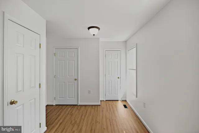 a view of room with hardwood floor