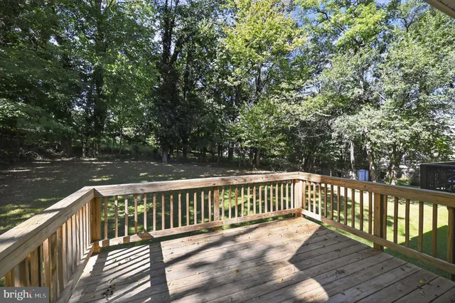 a view of a wooden roof deck