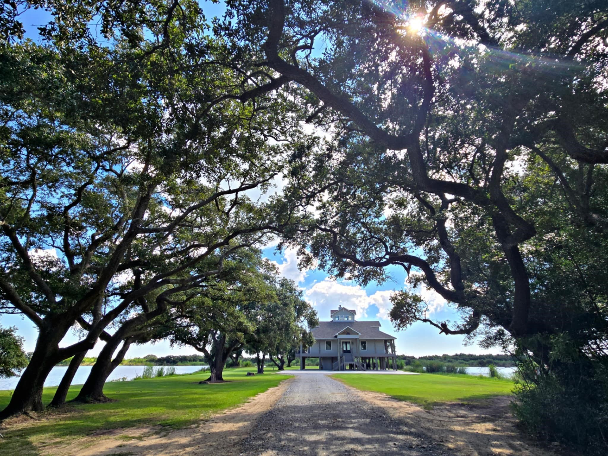 a view of a house with a big yard