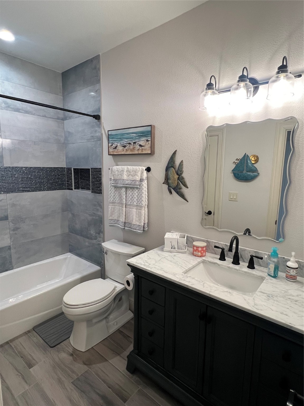 7165 Backridge Road Sabine Pass, TX 77655 - Photo 24 of 49 a bathroom with a sink toilet and shower