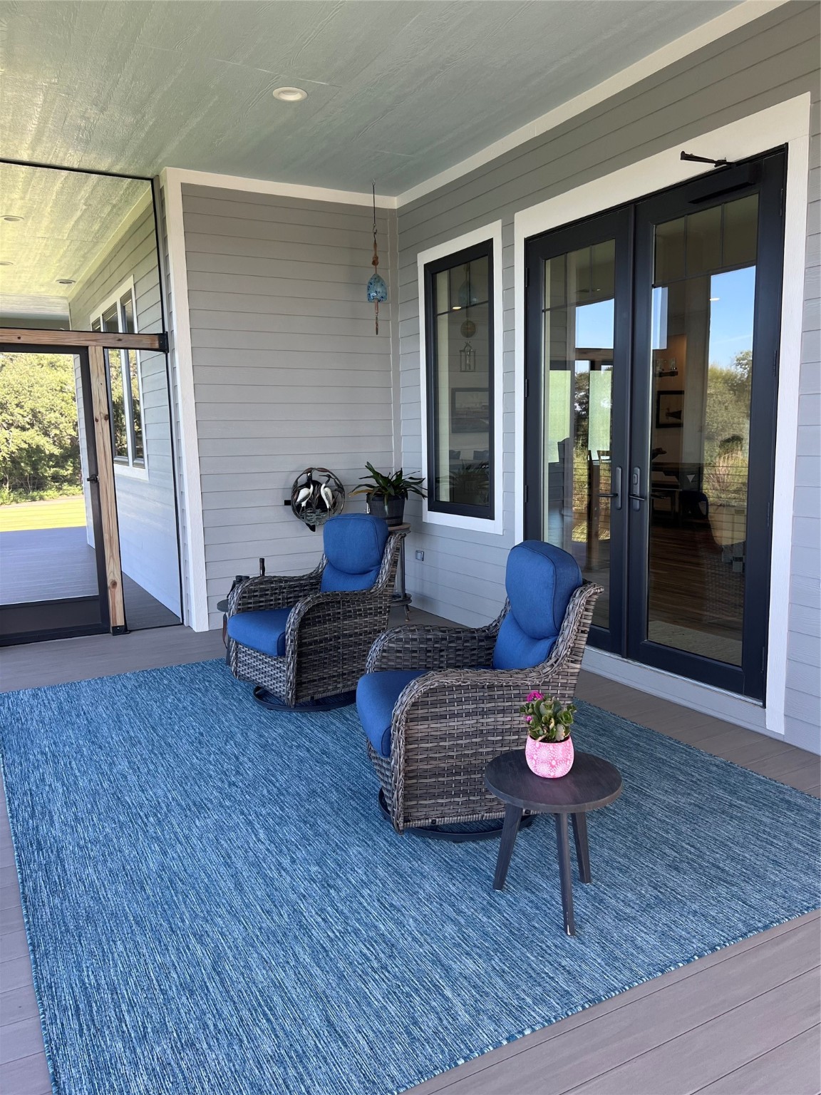 7165 Backridge Road Sabine Pass, TX 77655 - Photo 29 of 49 a living room with furniture and a rug
