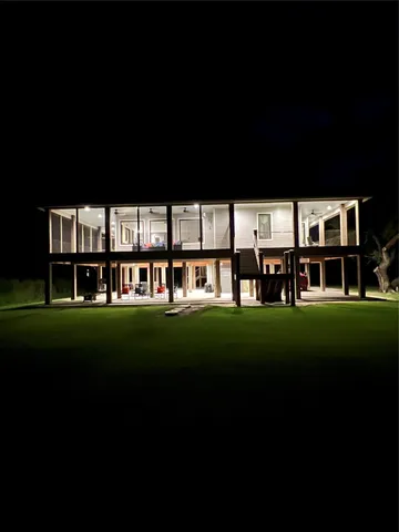 a view of a house with a big yard