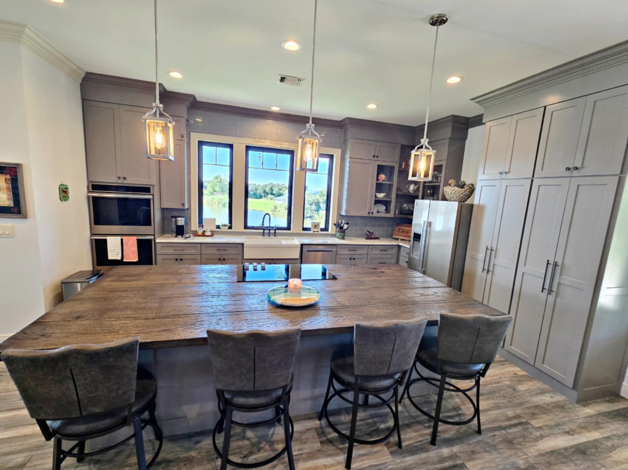 7165 Backridge Road Sabine Pass, TX 77655 - Photo 10 of 49 a view of a dining room with furniture