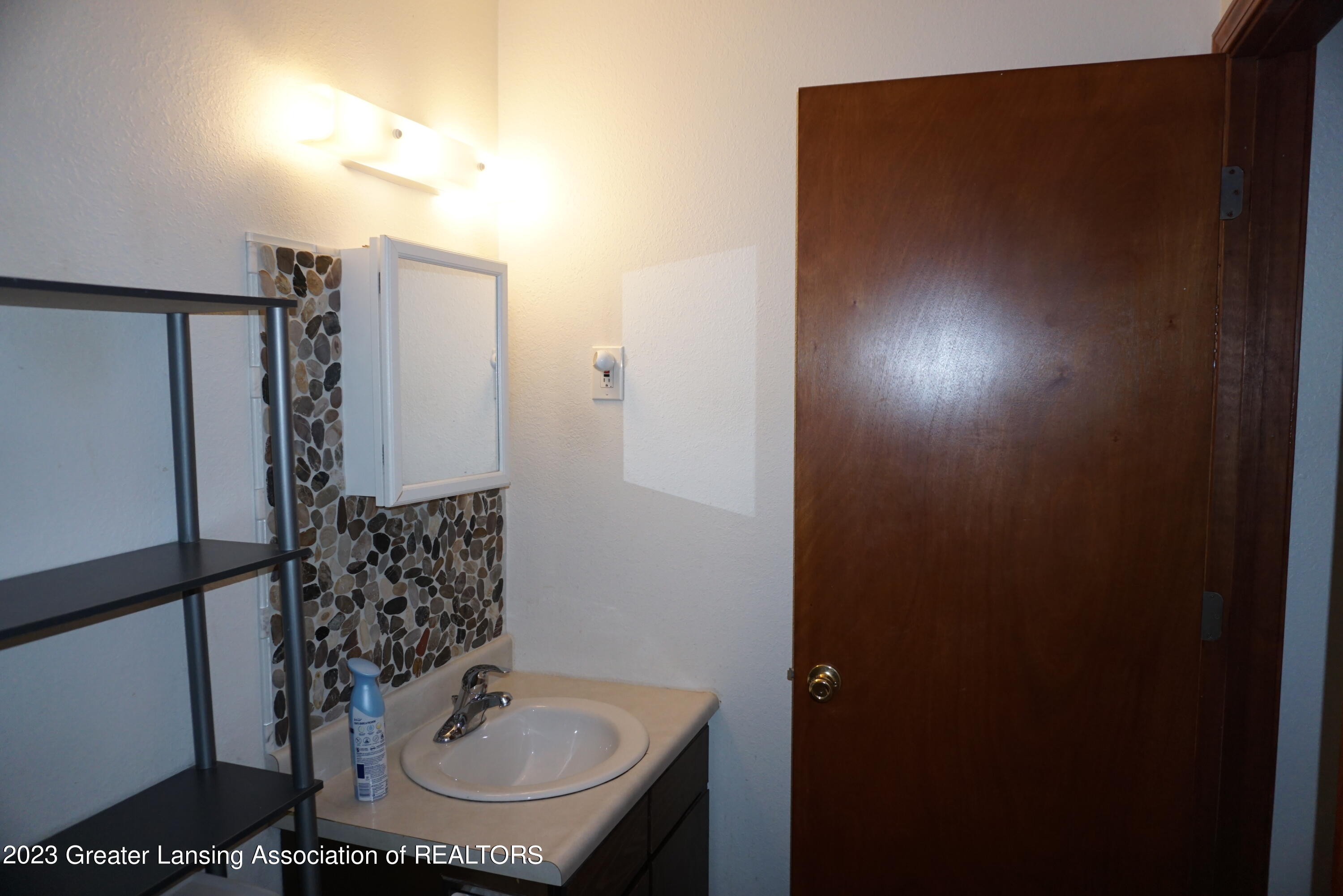 3922 Hunters Ridge Drive, Unit 4 Lansing, MI 48911 - Photo 16 of 23 DSC00734