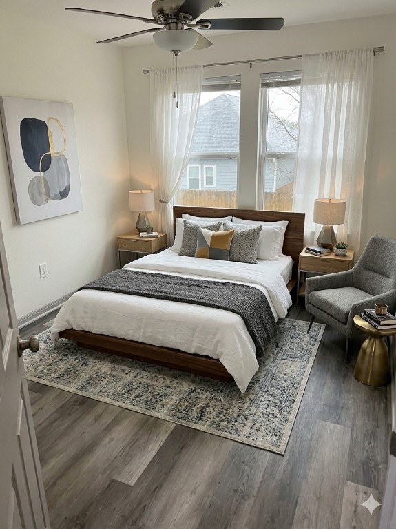 8113 Corinth Street, Unit B Houston, TX 77051 - Photo 9 of 15 a bedroom with a bed and wooden floor