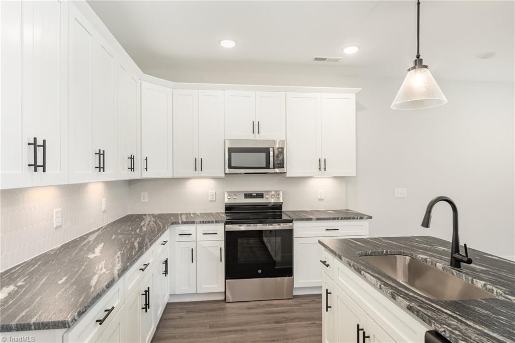 Fabulous kitchen with leathered granite countertops