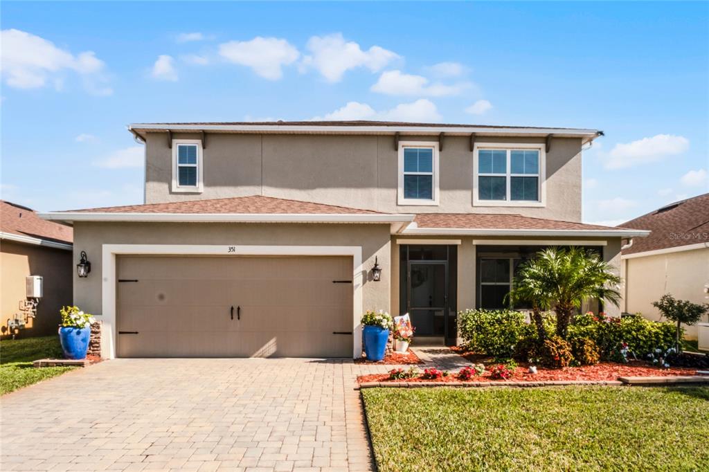 351 Lazio Circle DeBary, FL 32713 - Photo 1 of 1 a front view of a house with a yard