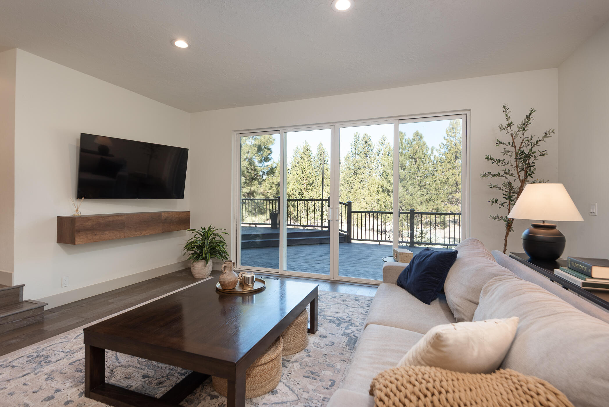 60012 West Ridgeview Drive Bend, OR 97702 - Photo 3 of 55 a living room with furniture and a flat screen tv