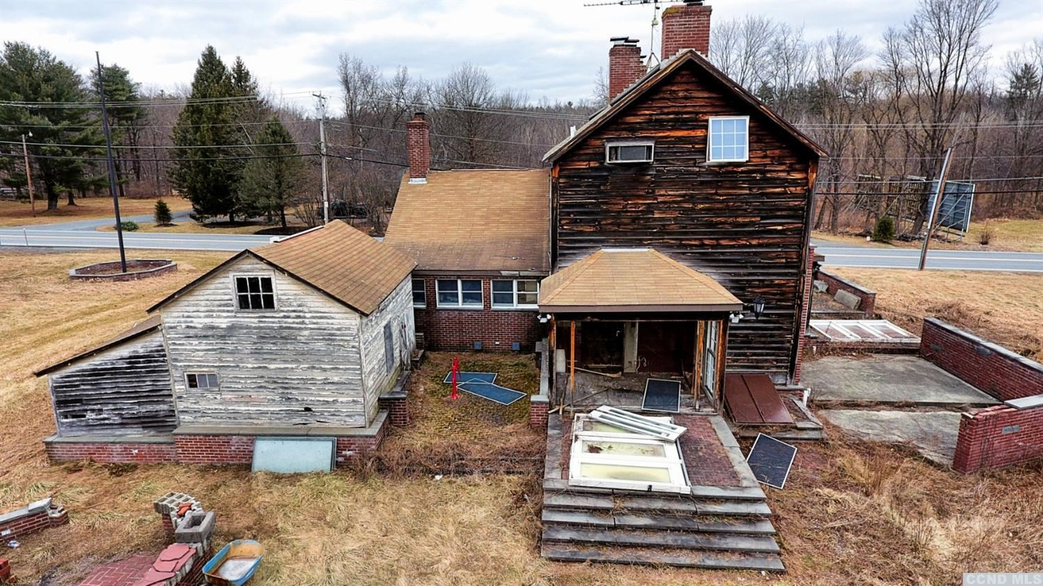 189 Main Street Cairo, NY 12413 - Photo 11 of 57 a front view of a house with a yard