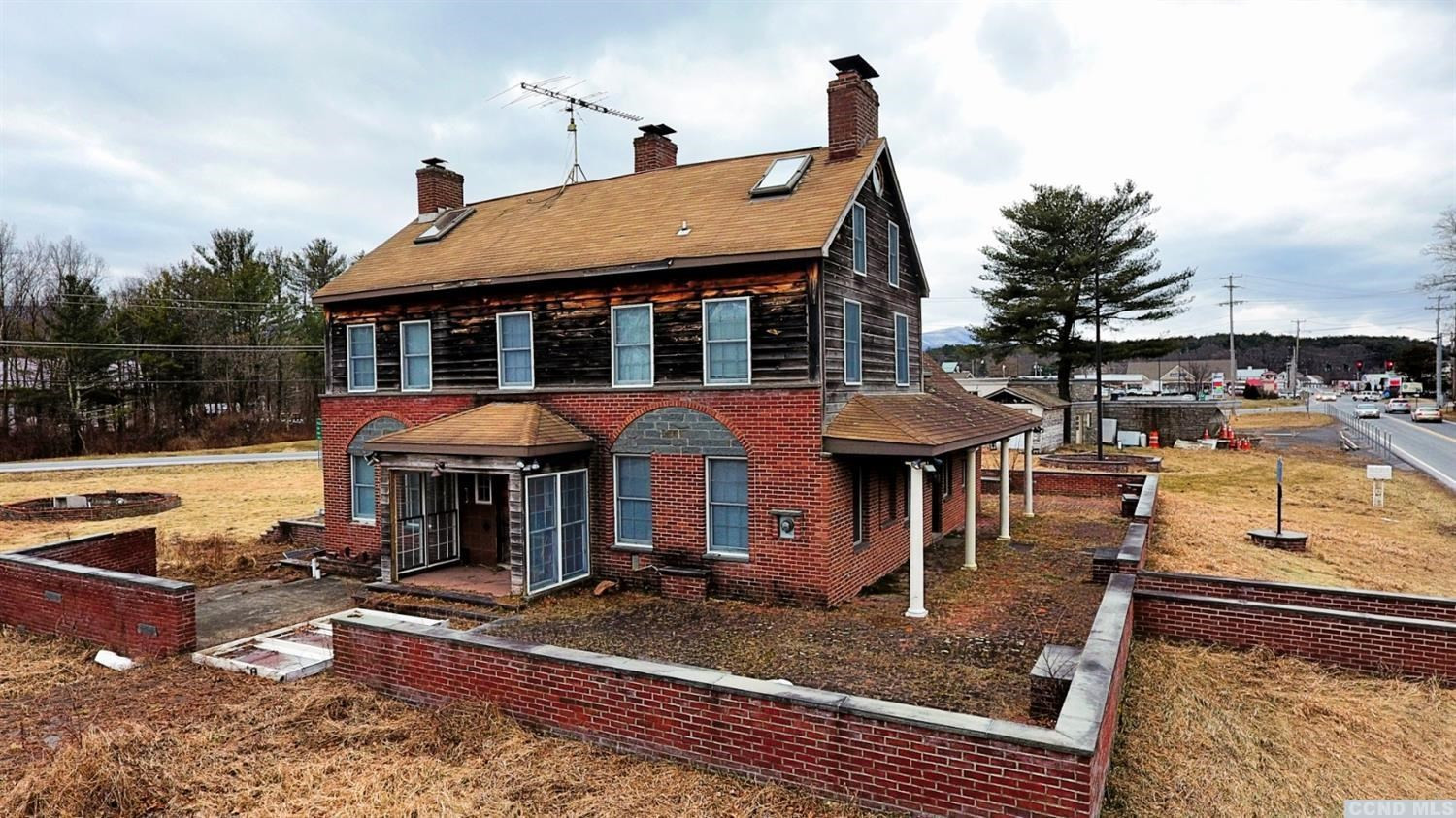 189 Main Street Cairo, NY 12413 - Photo 13 of 57 a front view of a house with sitting area