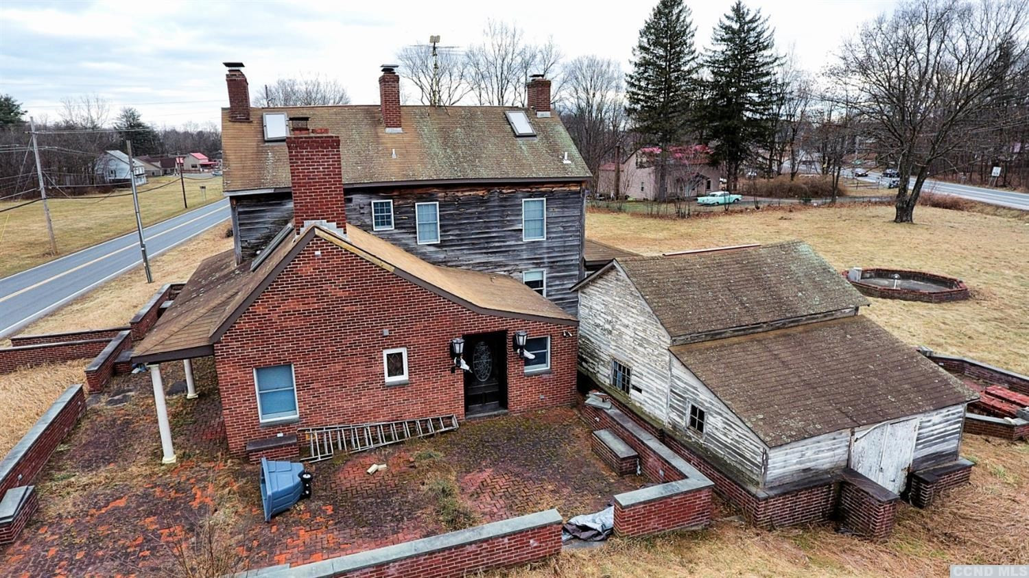 189 Main Street Cairo, NY 12413 - Photo 17 of 57 an aerial view of a house with a yard