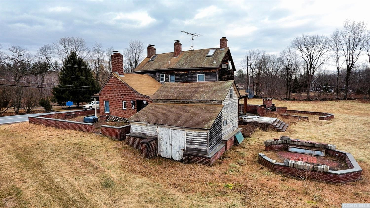 189 Main Street Cairo, NY 12413 - Photo 18 of 57 a view of a house with backyard and sitting area