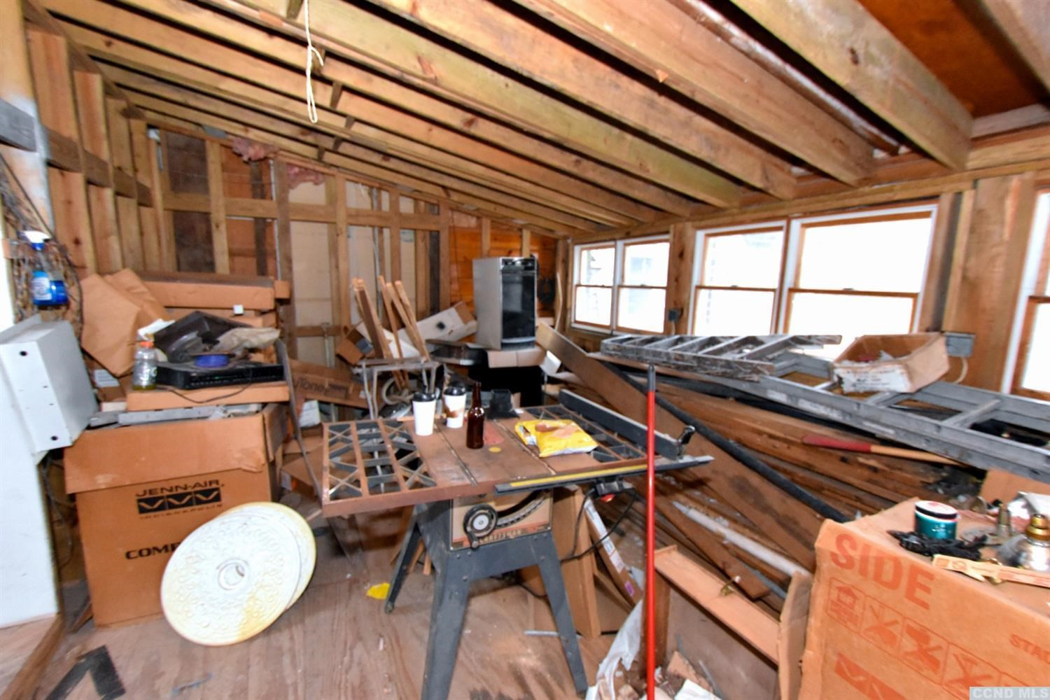 189 Main Street Cairo, NY 12413 - Photo 53 of 57 a room with wooden furniture and a rug