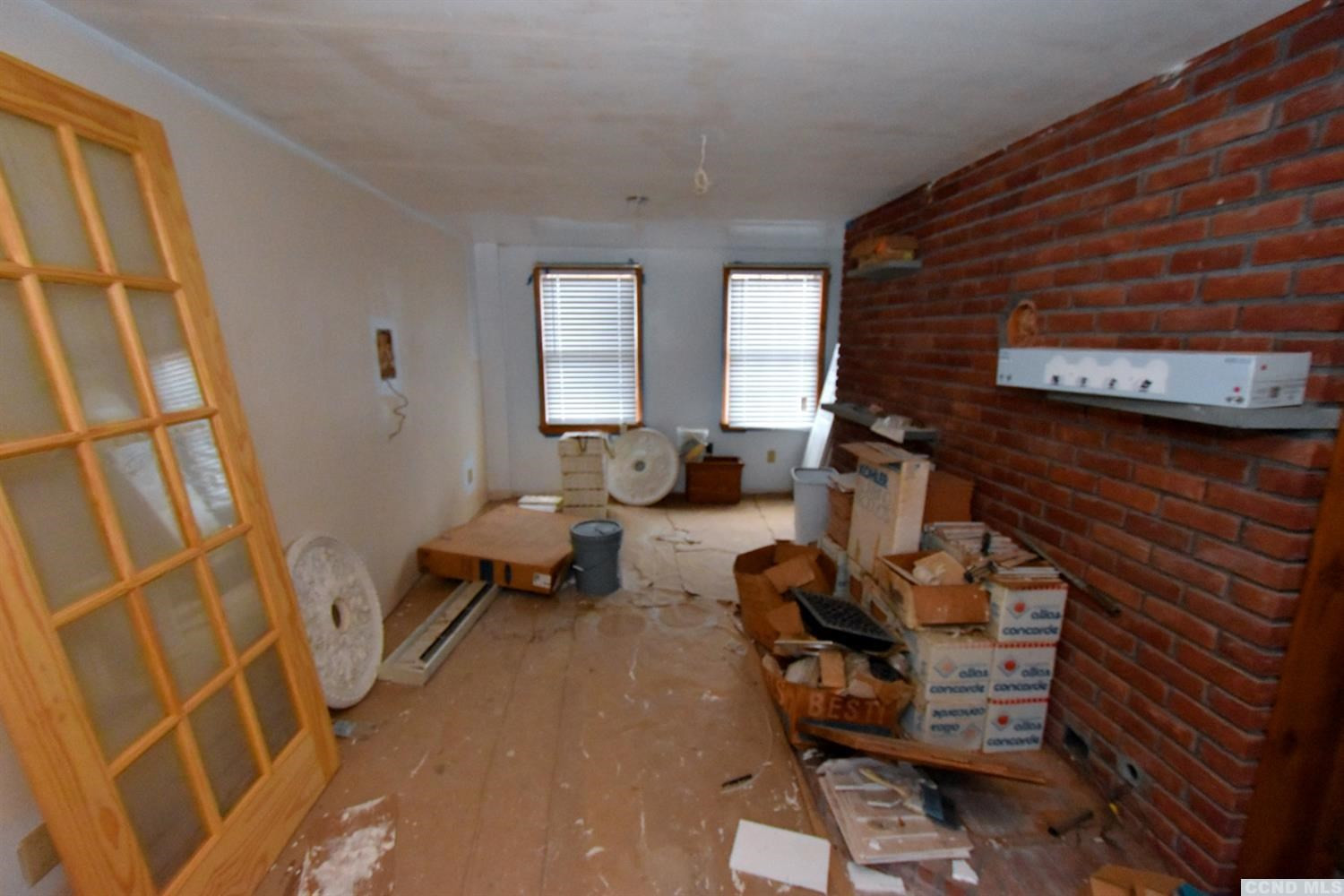 189 Main Street Cairo, NY 12413 - Photo 55 of 57 a living room with furniture and a window