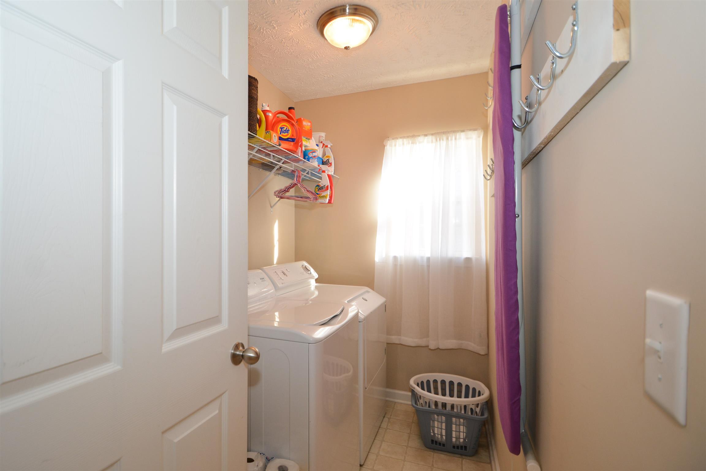 2026 Red Jacket Trace Spring Hill, TN 37174 - Photo 21 of 28 Nice sized laundry room with convenient wall storage.