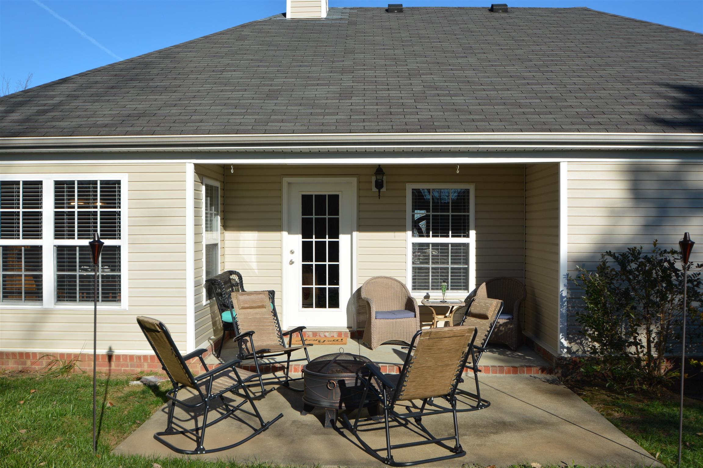 2026 Red Jacket Trace Spring Hill, TN 37174 - Photo 22 of 28 Covered patio with extended open patio gives plenty of room for seating.