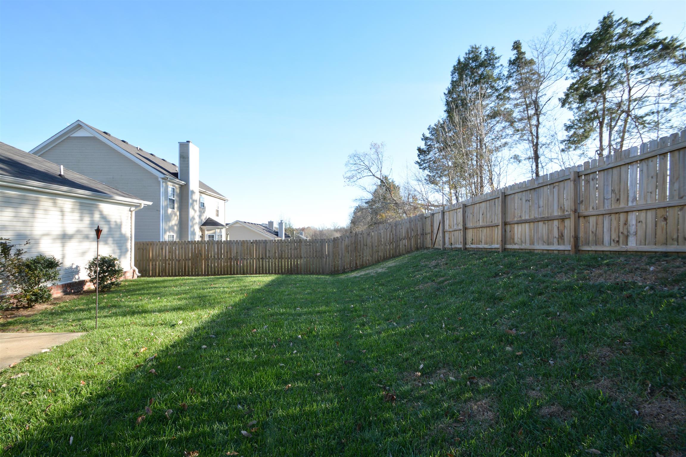 2026 Red Jacket Trace Spring Hill, TN 37174 - Photo 25 of 28 Large fenced backyard! Fence recently pressure washed.