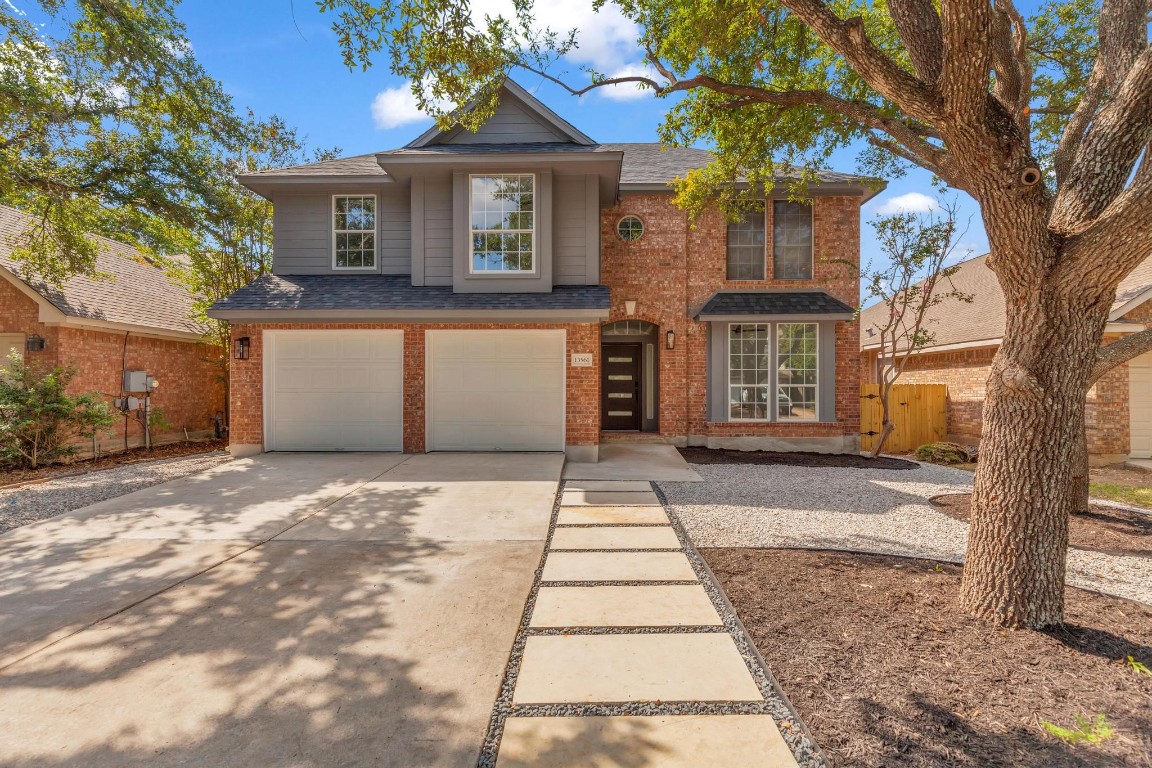 13561 Anarosa Loop Austin, TX 78727 - Photo 1 of 1 a front view of a house with a yard