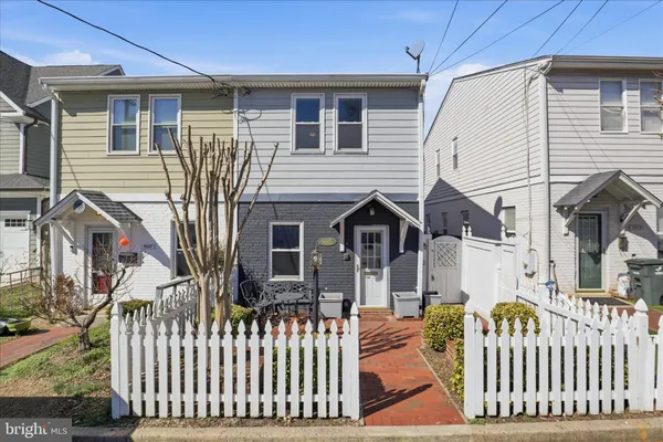 a front view of a house with a porch