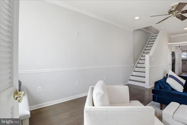 a view of livingroom with furniture and wooden floor