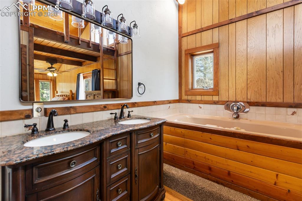 351 Porphry Road Florissant, CO 80816 - Photo 17 of 43 Primary bathroom with jetted tub and dual sinks